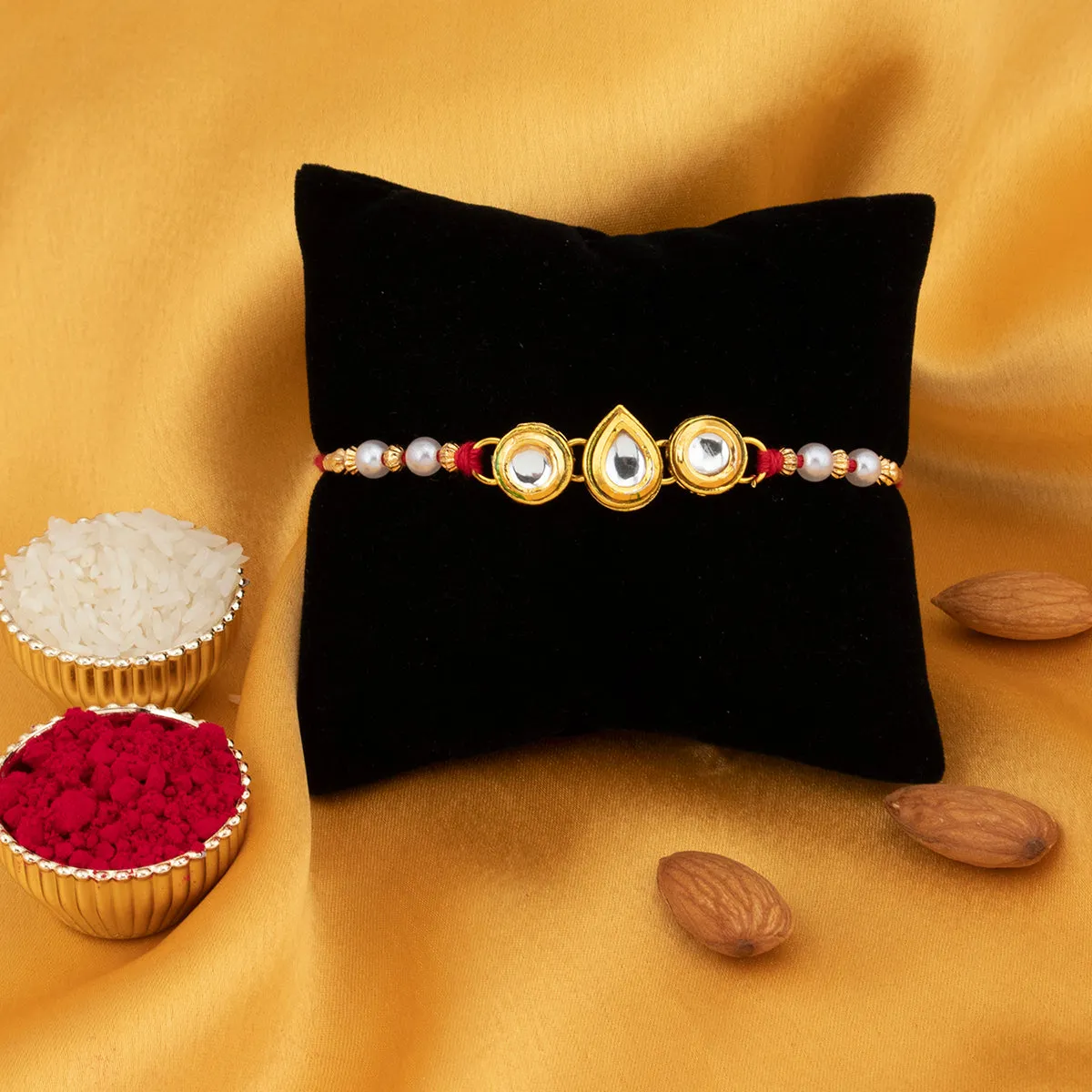 Sukkhi Astonish Gold Plated Kundan Rakhi for Brother with Roli Chawal and Raksha Bandhan Greeting Card For Men